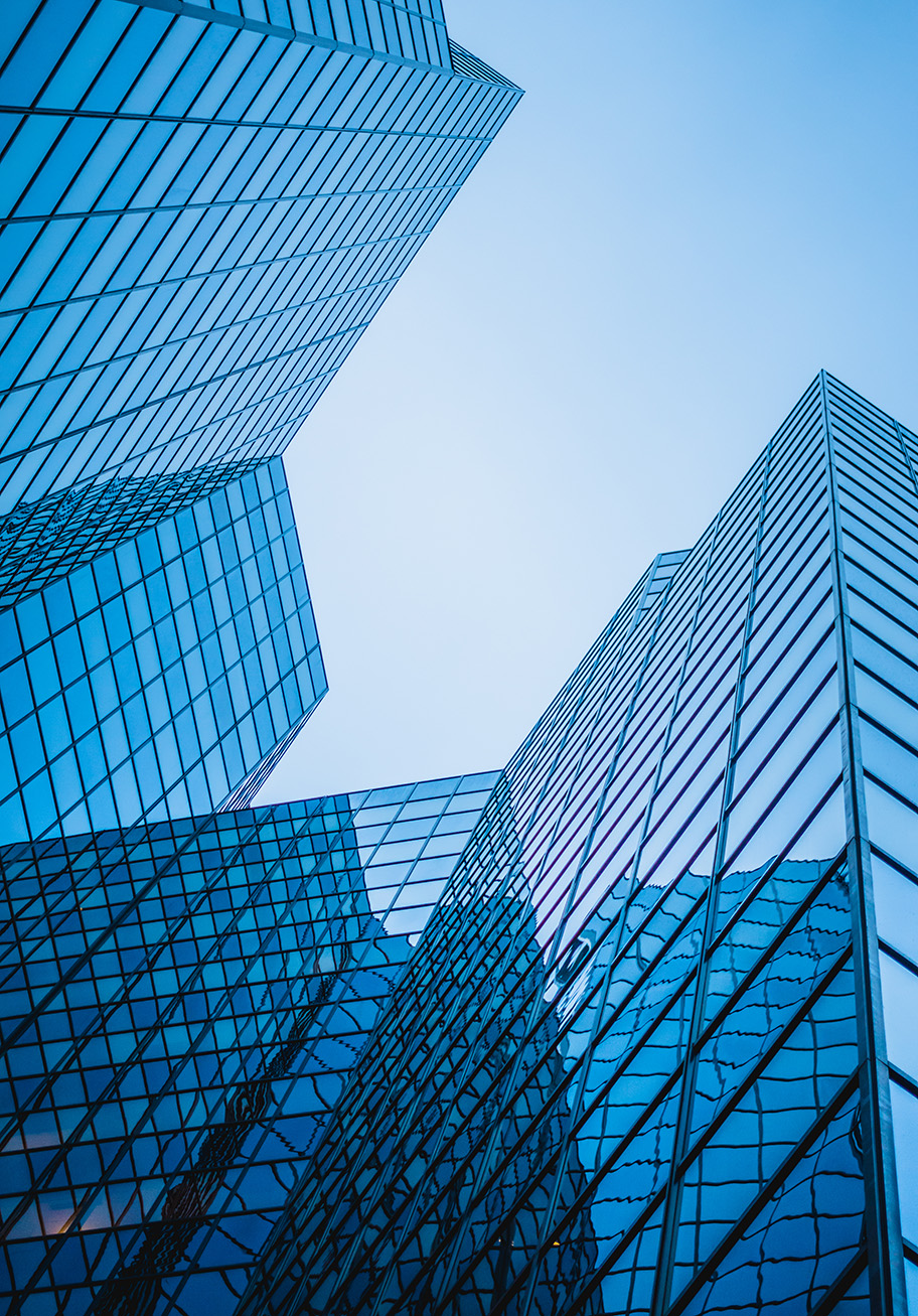 Modern Blue Glass Skyscrapers Against Light Blue S 2026 03 09 05 23 29 Utc (2) (1)
